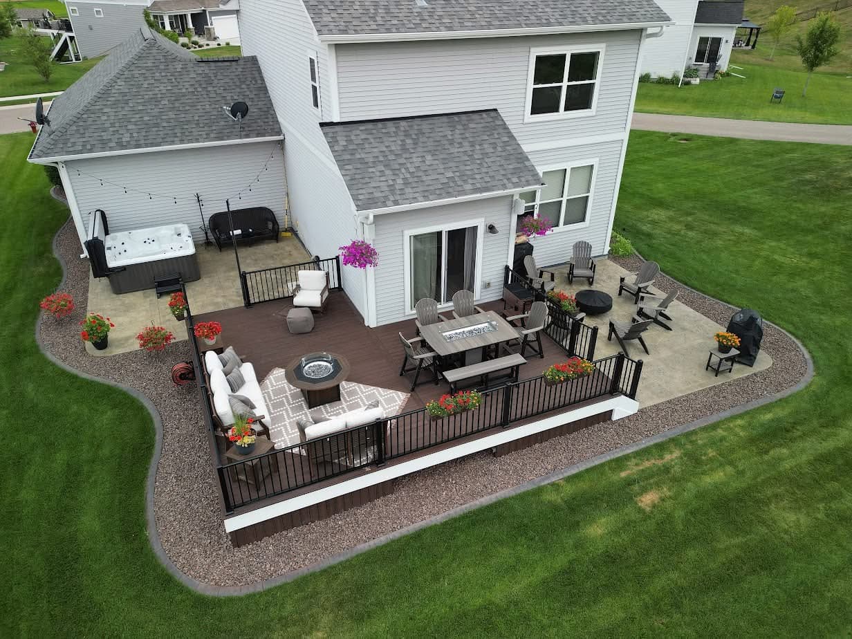 Multi-level deck with a fire pit and hot tub built by House of Decks in North New Jersey